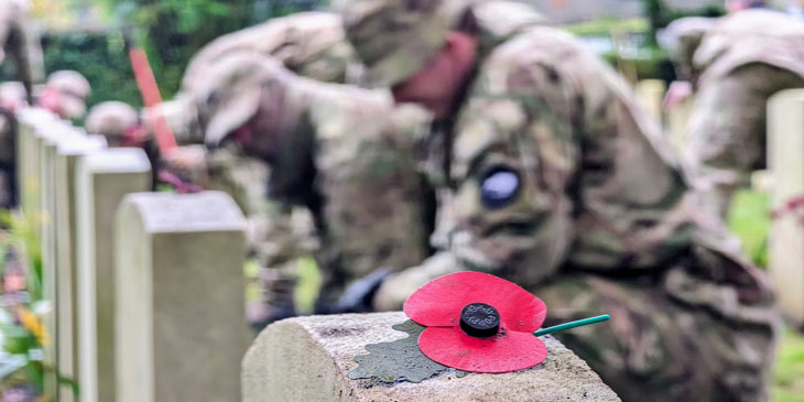 ANZAC soldiers pitch in at Codford War Cemetery, Wiltshire