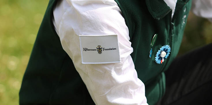 Close up of a patch with the Rothermere Foundation logo on the arm of a CWGF Guide