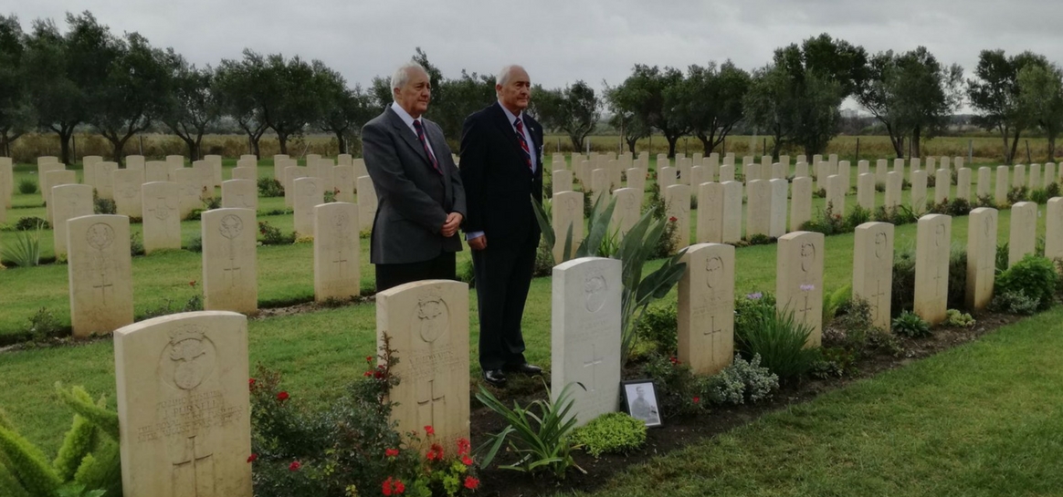 Twin sons attend rededication service for their father after helping to trace his grave