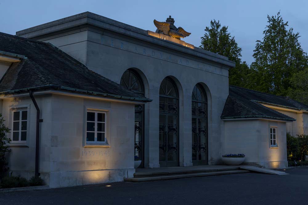 Runnymede Memorial entrance illuminated by floodlights
