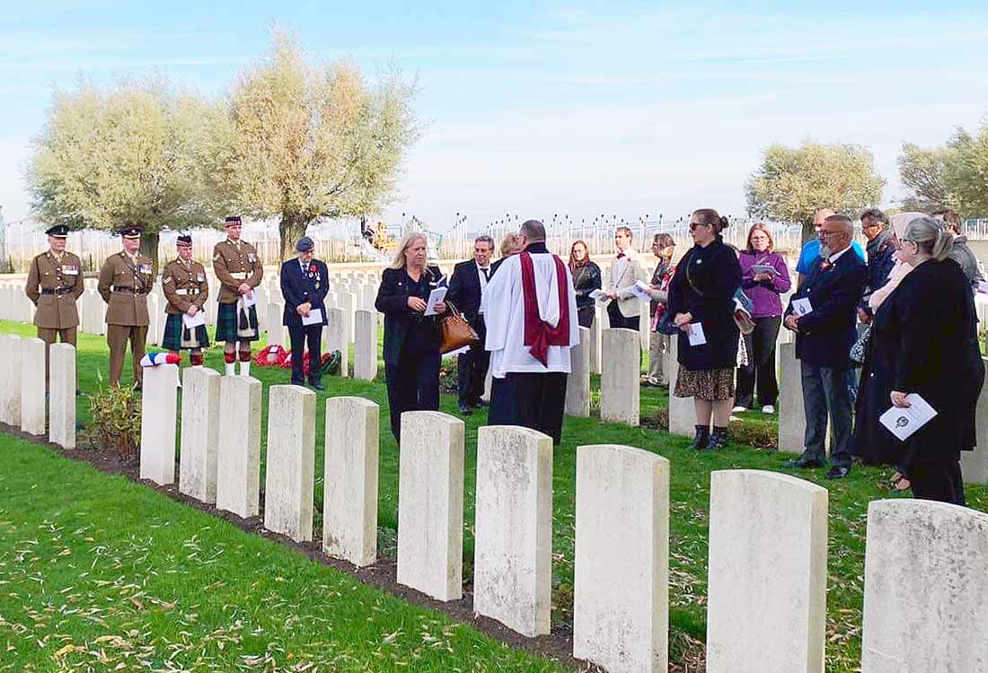 Rededication service for Private Thomas Parry, King's Own Scottish Borderers at Perth Cemetery (China Wall), Belgium
