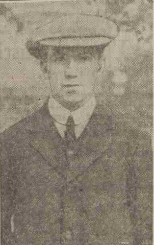 Able Seaman Alexander Duncan in civilan clothing including large peaked cap.