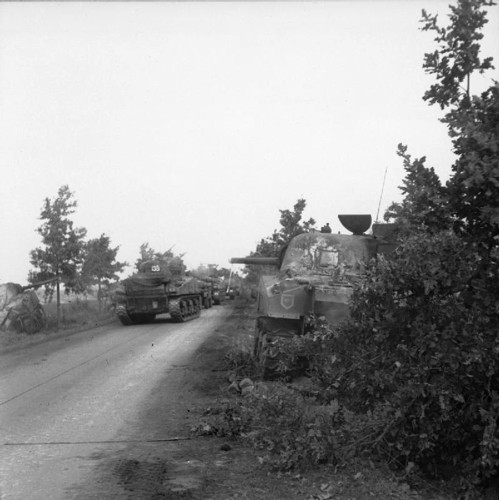 Sherman tanks of the Irish Guards advance during Operation Market Garden.